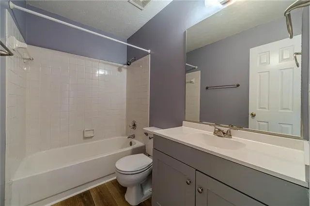 a view of house with yard and front view