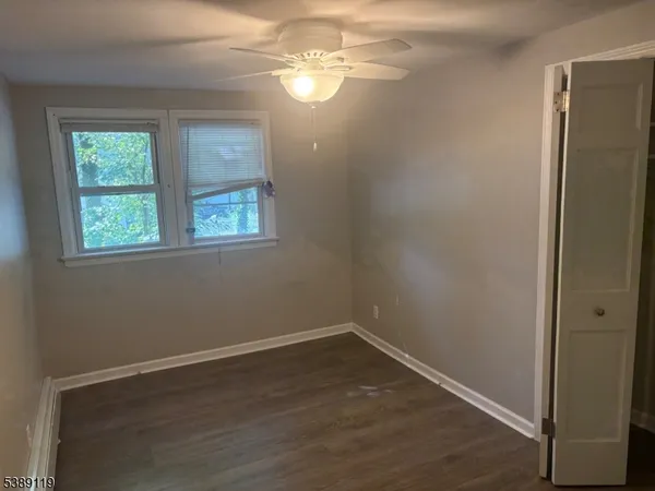 a view of a room that has a window in it