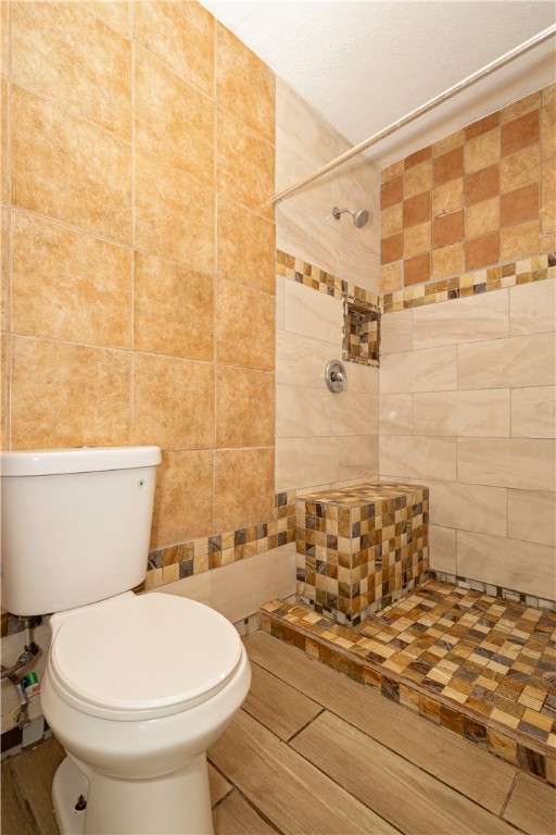 726 Anderson Street Corpus Christi, TX 78411 - Photo 13 of 19 a bathroom with a toilet and a shower