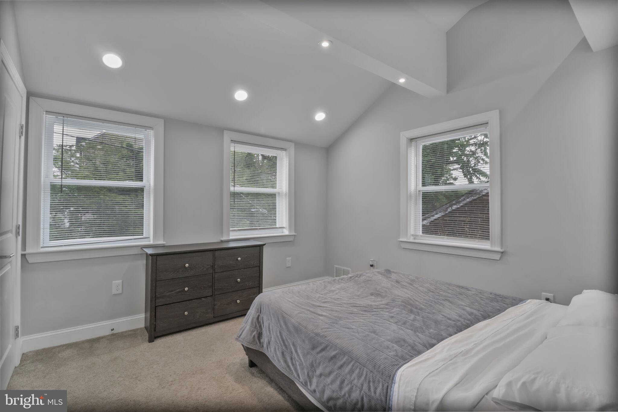 1423 Howard Road Southeast Washington, DC 20020 - Photo 22 of 45 a bedroom with a bed and window