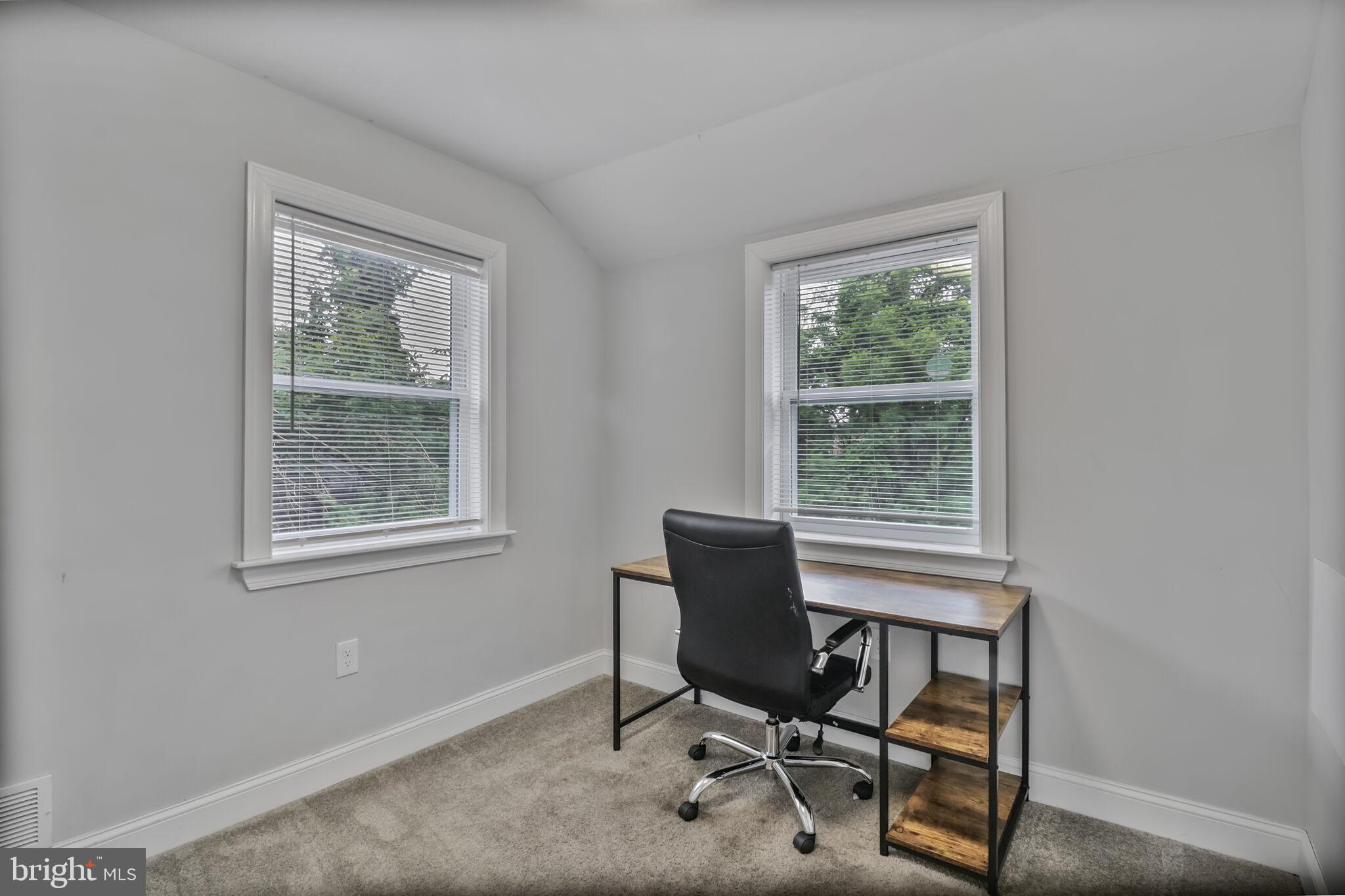 1423 Howard Road Southeast Washington, DC 20020 - Photo 27 of 45 a workspace with furniture and a window