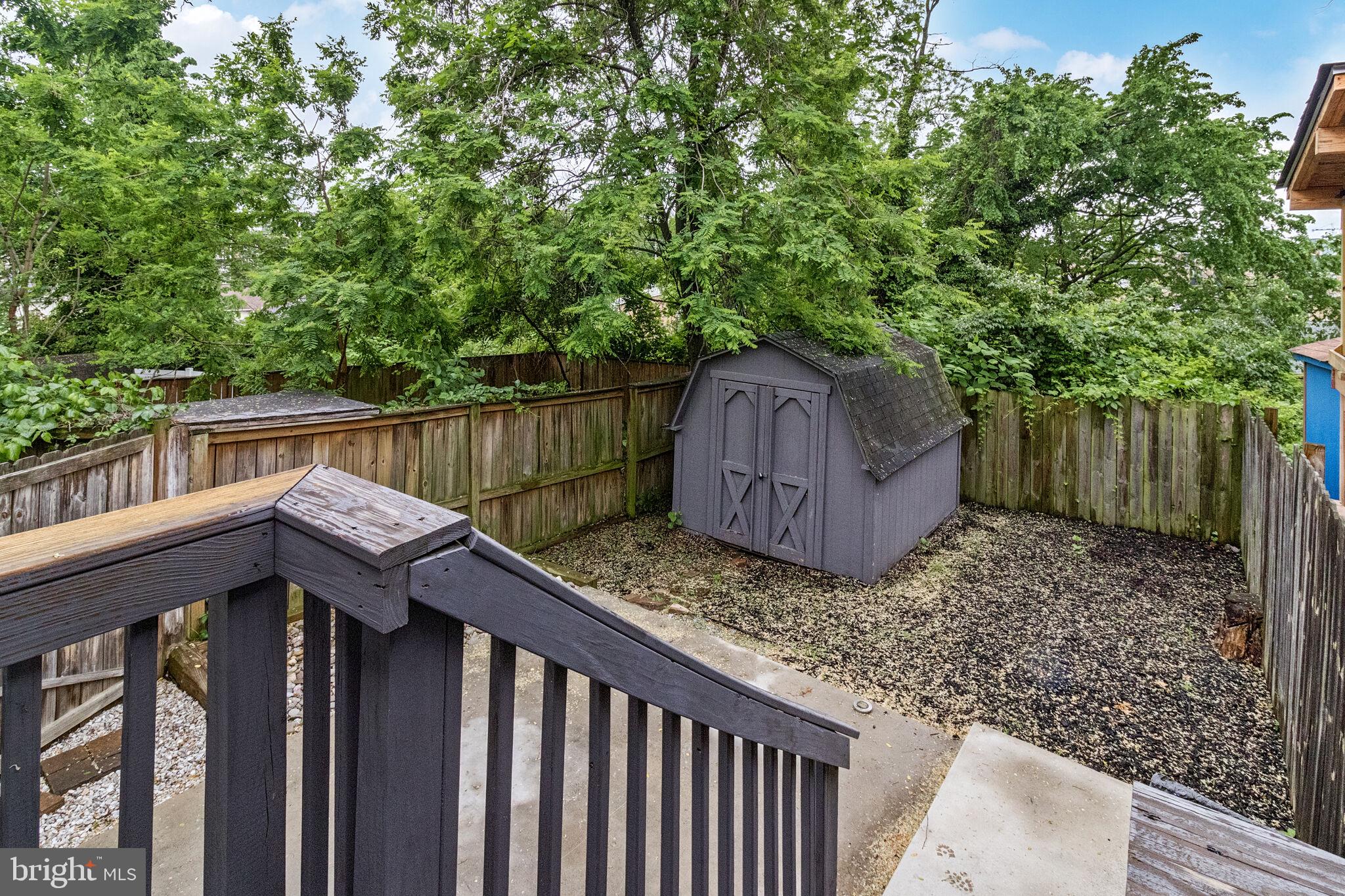1423 Howard Road Southeast Washington, DC 20020 - Photo 33 of 45 a backyard of a house with lots of green space
