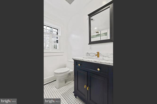 2347 South Arlington Ridge Road Arlington, VA 22202 - Photo 18 of 42 Sleek modern bathroom with elegance.