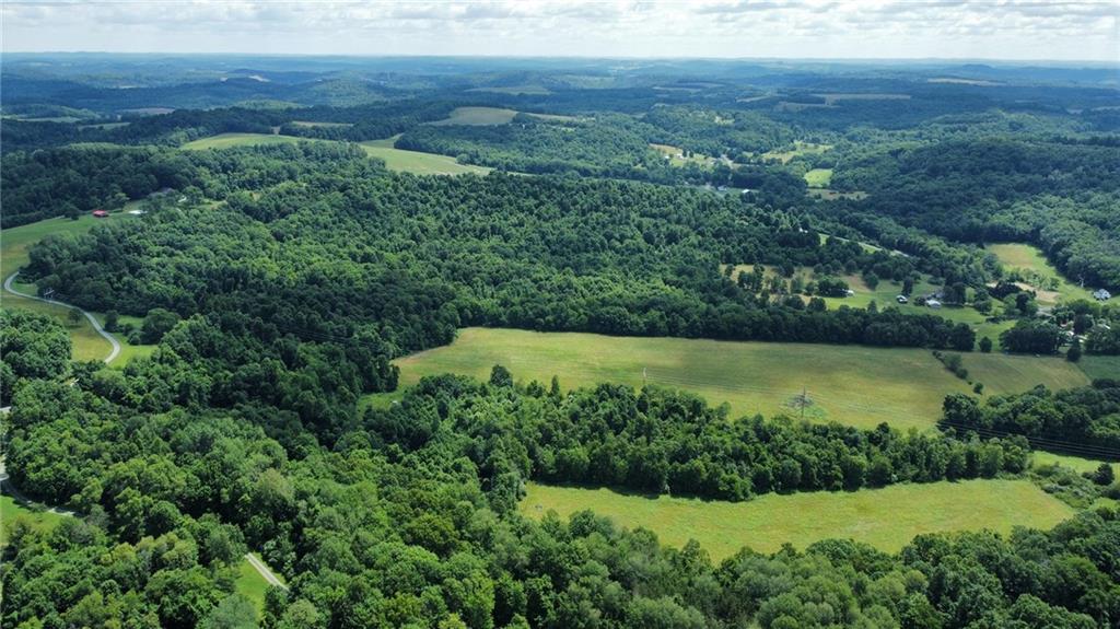 0 Borovick Road Sligo, PA 16255 - Photo 5 of 11 a view of a yard with an outdoor space and deck