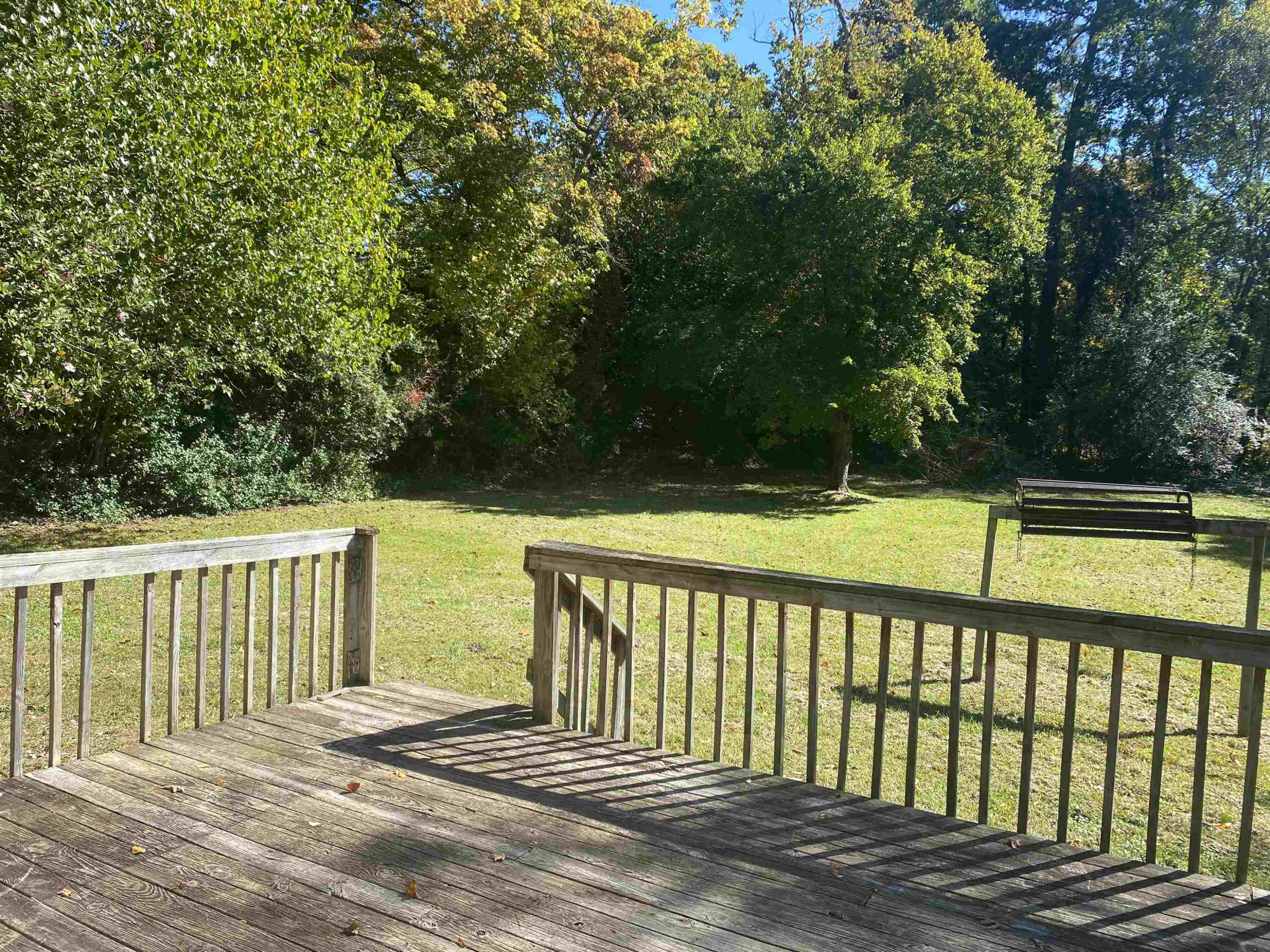 633 Buck Jones Road Raleigh, NC 27606 - Photo 19 of 20 a view of a balcony with wooden floor