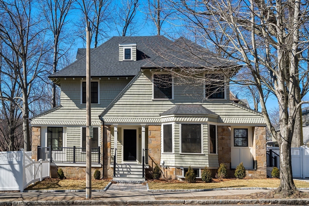 8 Stetson Street Brookline, MA 02446 - Photo 2 of 36 a front view of a house with a yard