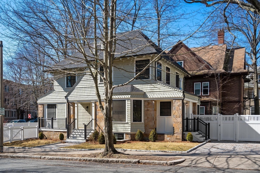 8 Stetson Street Brookline, MA 02446 - Photo 28 of 36 a front view of a house with a yard