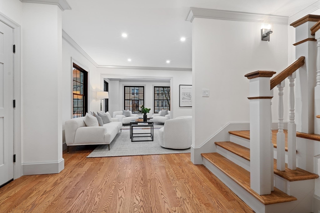 8 Stetson Street Brookline, MA 02446 - Photo 5 of 36 a living room with furniture and a wooden floor