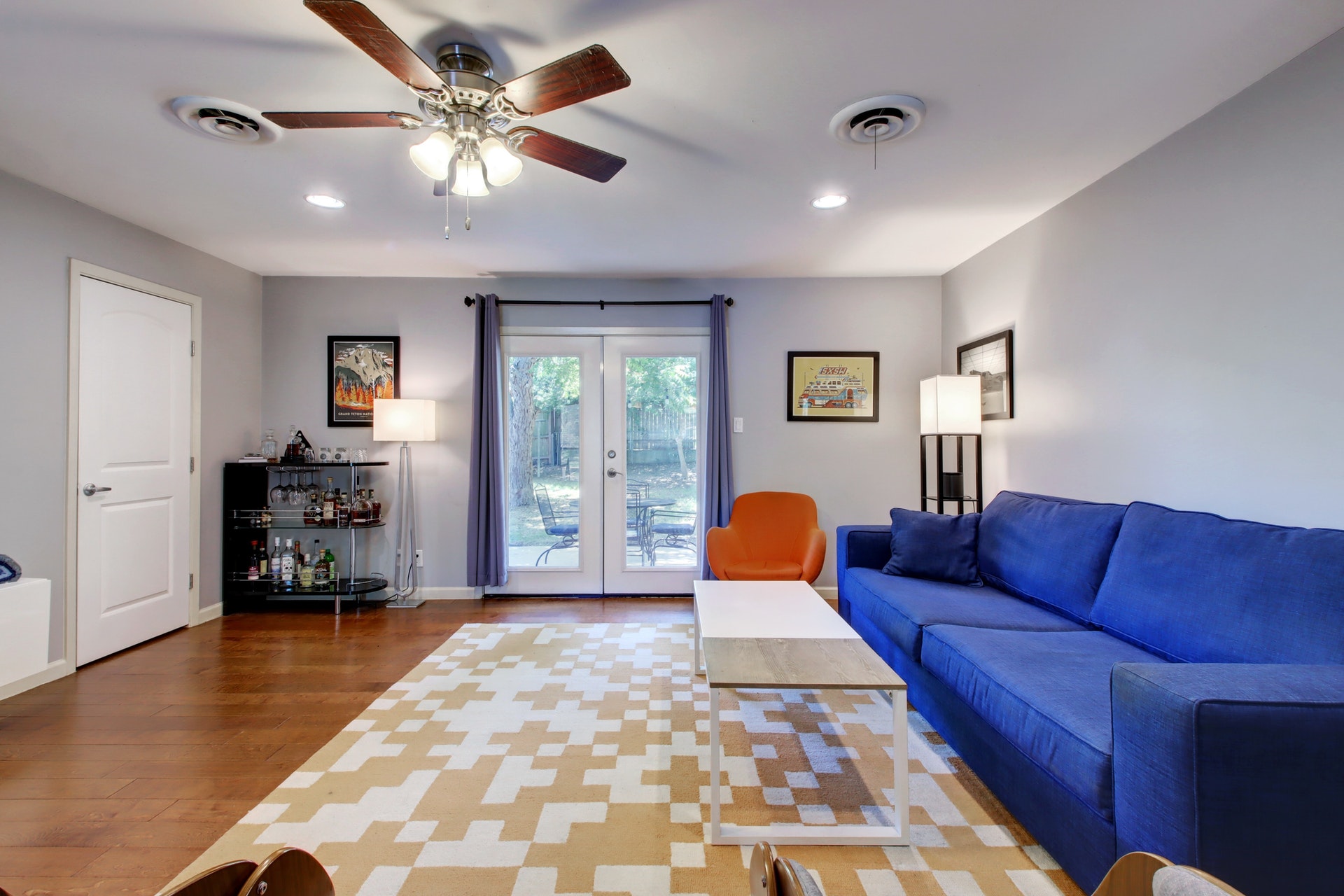 6709 Columbia Drive Austin, TX 78723 - Photo 5 of 24 a living room with furniture and a dining table with wooden floor
