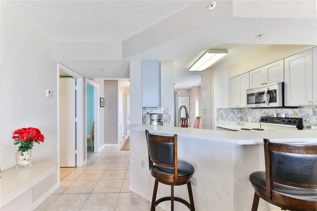 a kitchen with sink and window