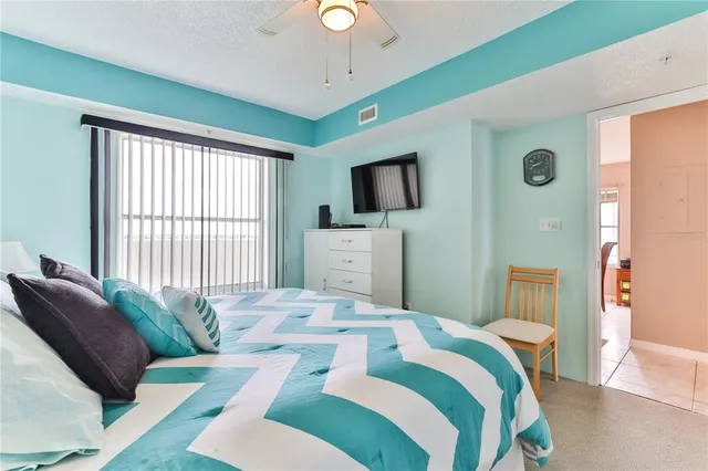 a bathroom with a sink vanity mirror and toilet