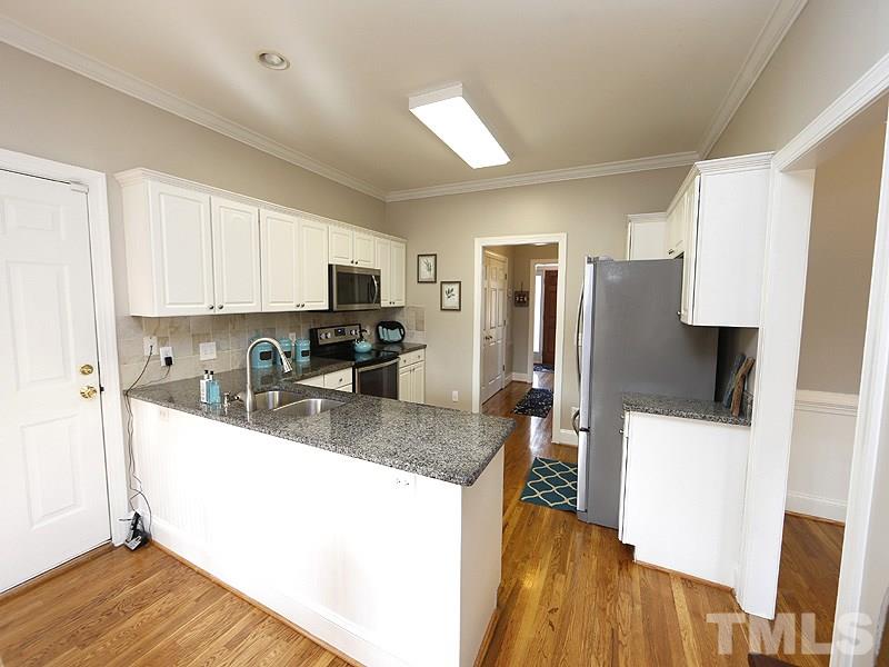5305 Back Sail Court Raleigh, NC 27613 - Photo 5 of 18 L-shaped kitchen..room for barstools.