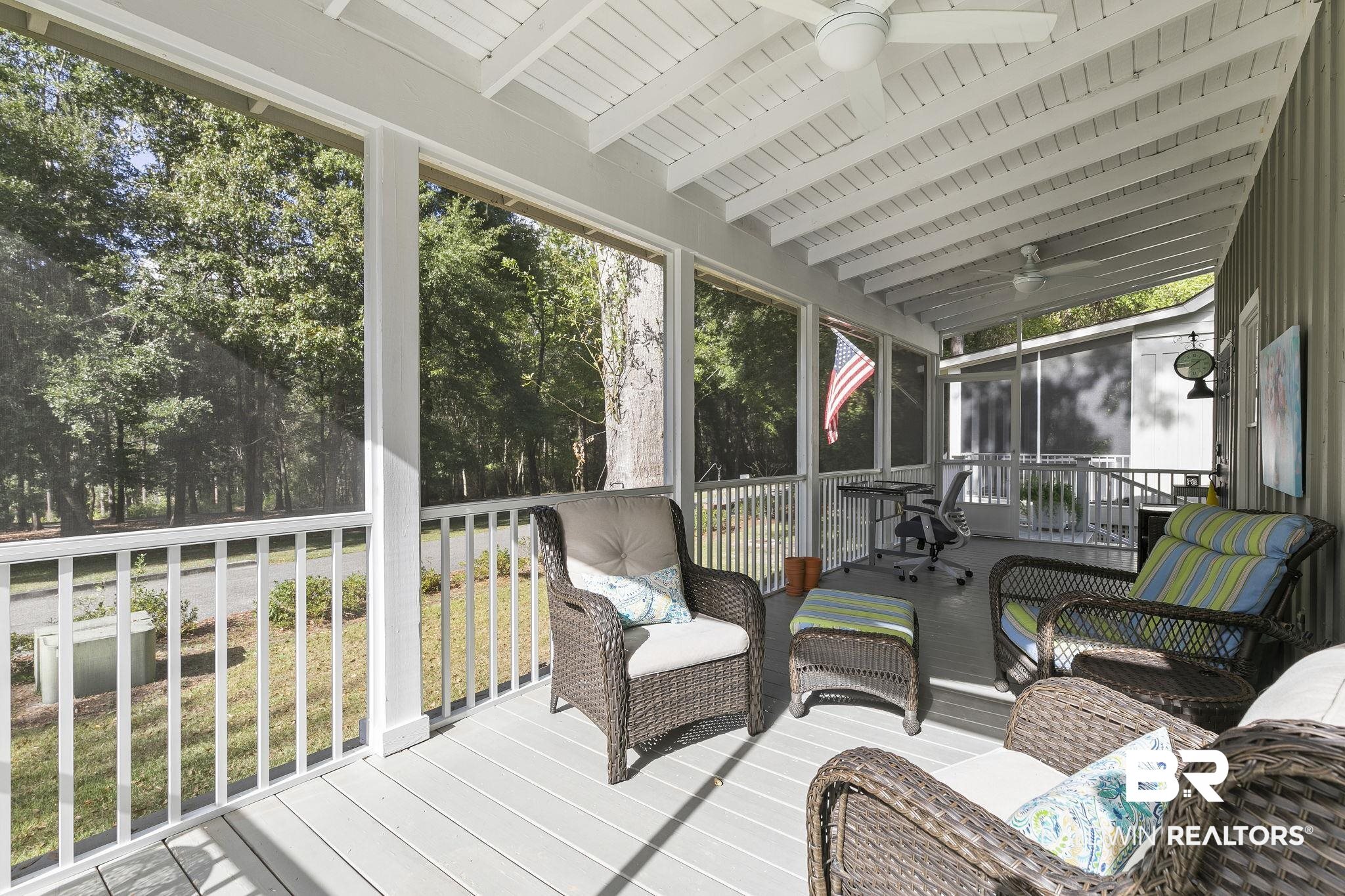 17341 Cabin Road Loxley, AL 36551 - Photo 9 of 49 screened porch with ceiling fans, wood ceiling, and vaulted ceiling with beams