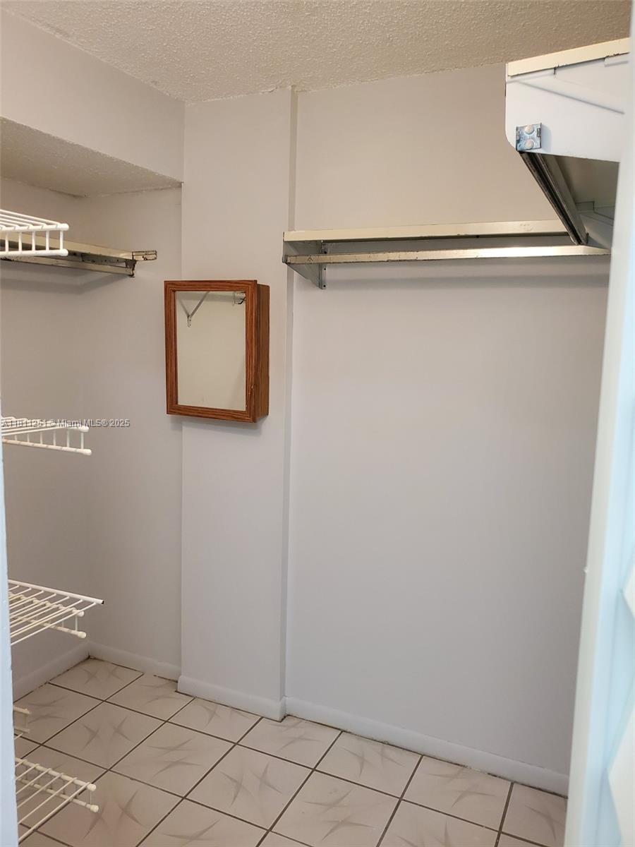 14250 Southwest 62nd Street, Unit 505 Miami, FL 33183 - Photo 21 of 38 a view of an empty room