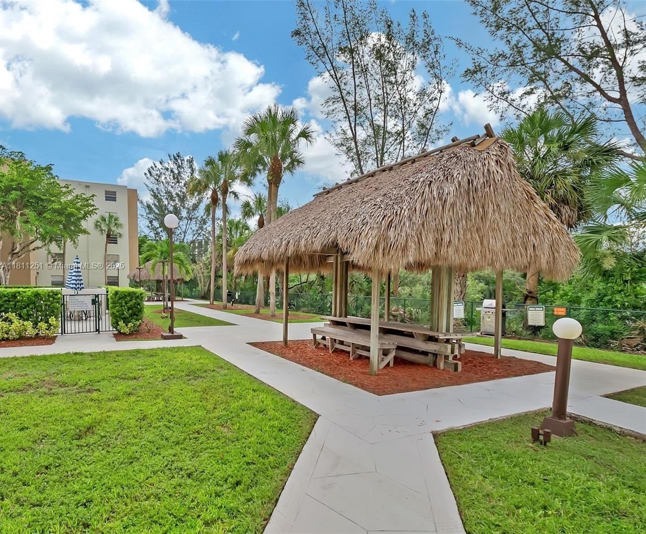 14250 Southwest 62nd Street, Unit 505 Miami, FL 33183 - Photo 28 of 38 a view of a park with slide