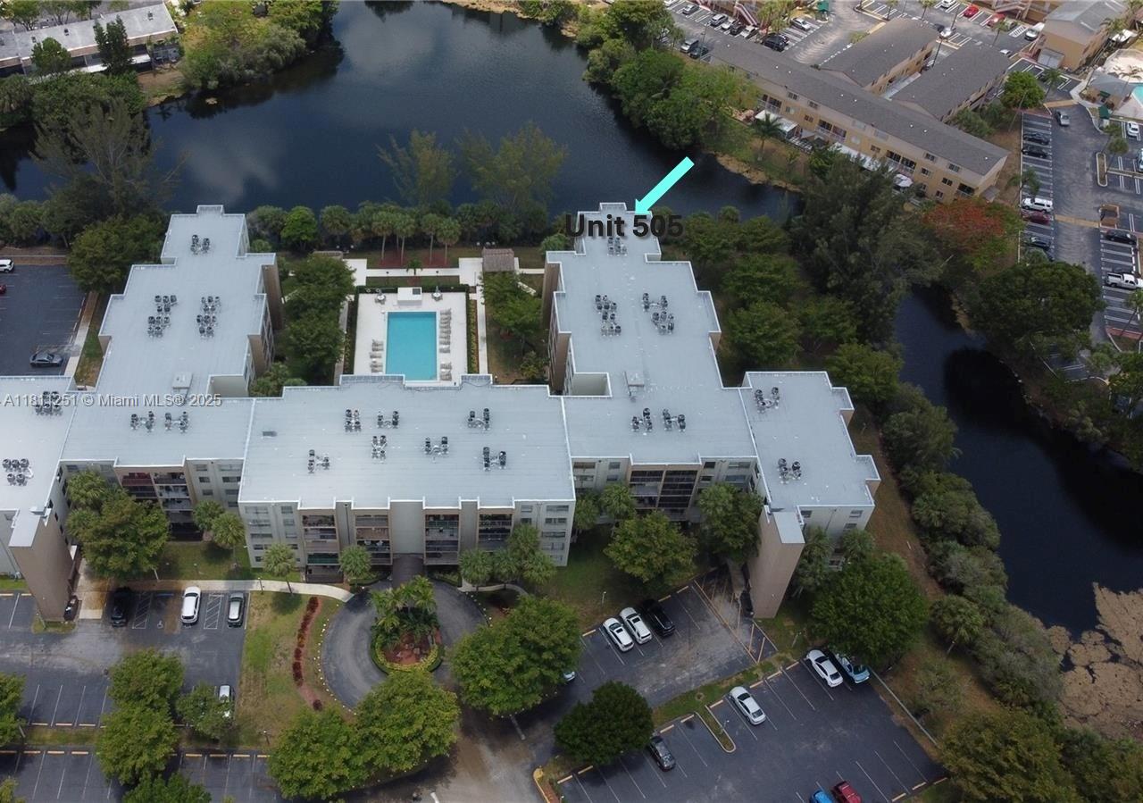 14250 Southwest 62nd Street, Unit 505 Miami, FL 33183 - Photo 31 of 38 an aerial view of a house with a yard