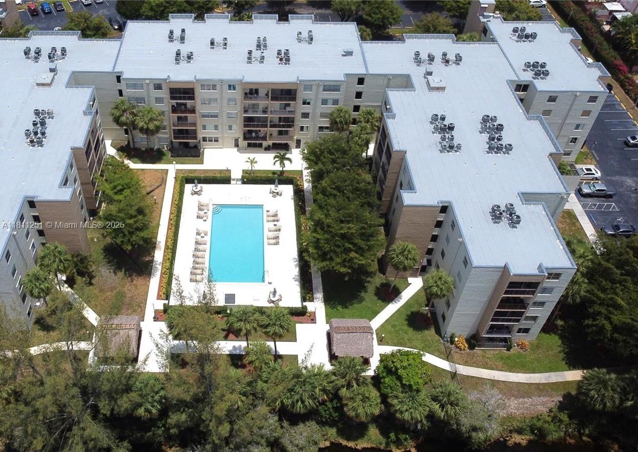 14250 Southwest 62nd Street, Unit 505 Miami, FL 33183 - Photo 32 of 38 an aerial view of residential house with outdoor space and parking