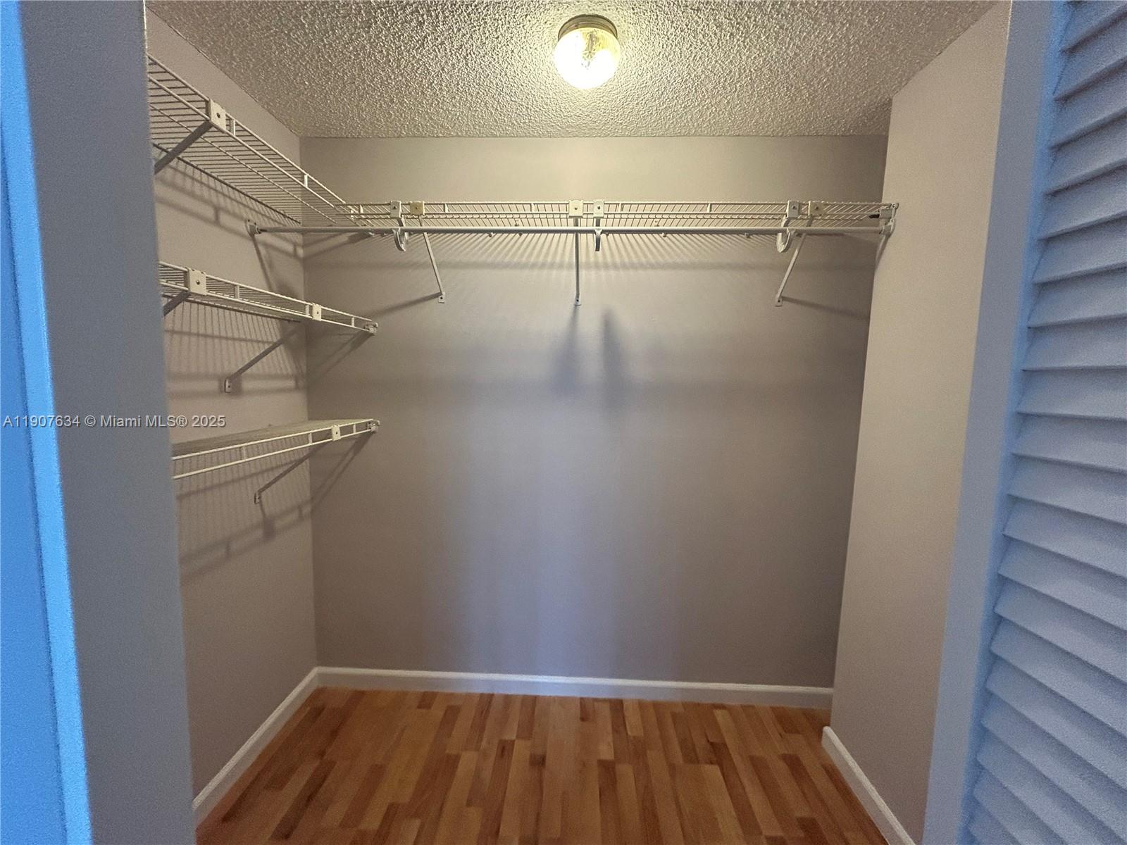 1000 Parkview Drive, Unit 511 Hallandale Beach, FL 33009 - Photo 11 of 17 a view of a room with racks on the wall