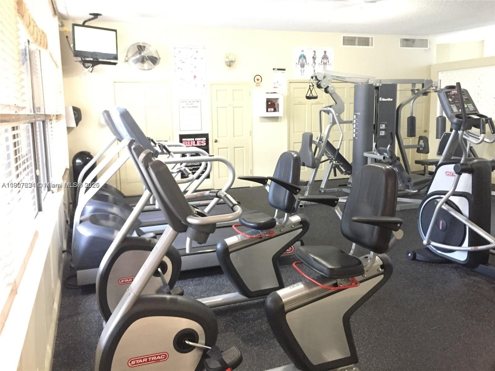 1000 Parkview Drive, Unit 511 Hallandale Beach, FL 33009 - Photo 15 of 17 a view of a room with gym equipment