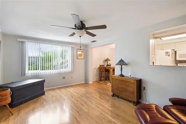 a living room with furniture and a window