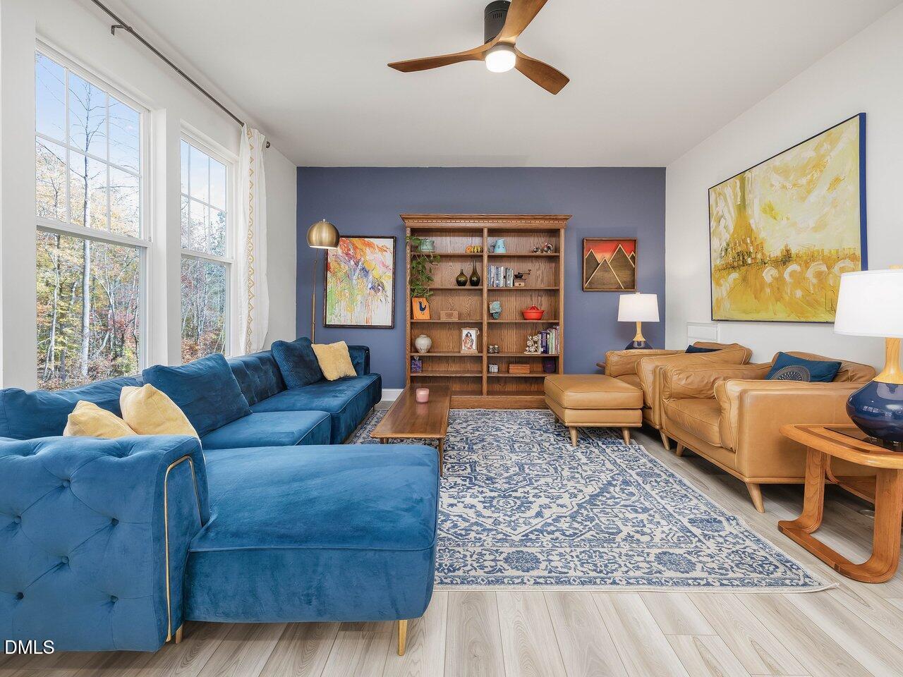 718 Heartpine Drive Mebane, NC 27302 - Photo 17 of 62 a living room with furniture and a rug