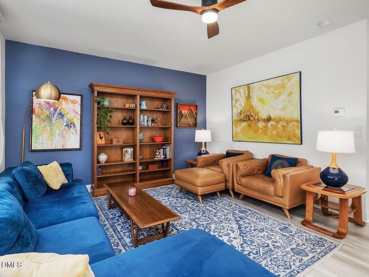 718 Heartpine Drive Mebane, NC 27302 - Photo 19 of 62 a living room with furniture and a rug