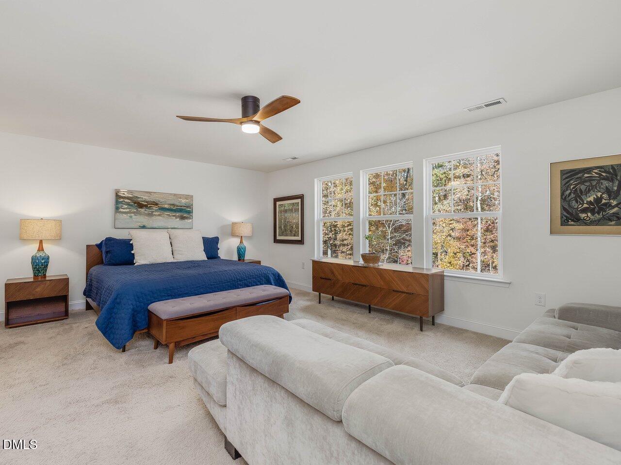 718 Heartpine Drive Mebane, NC 27302 - Photo 33 of 62 a bedroom with a large bed and a window