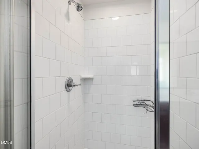 a living room with a couch and a flat screen tv