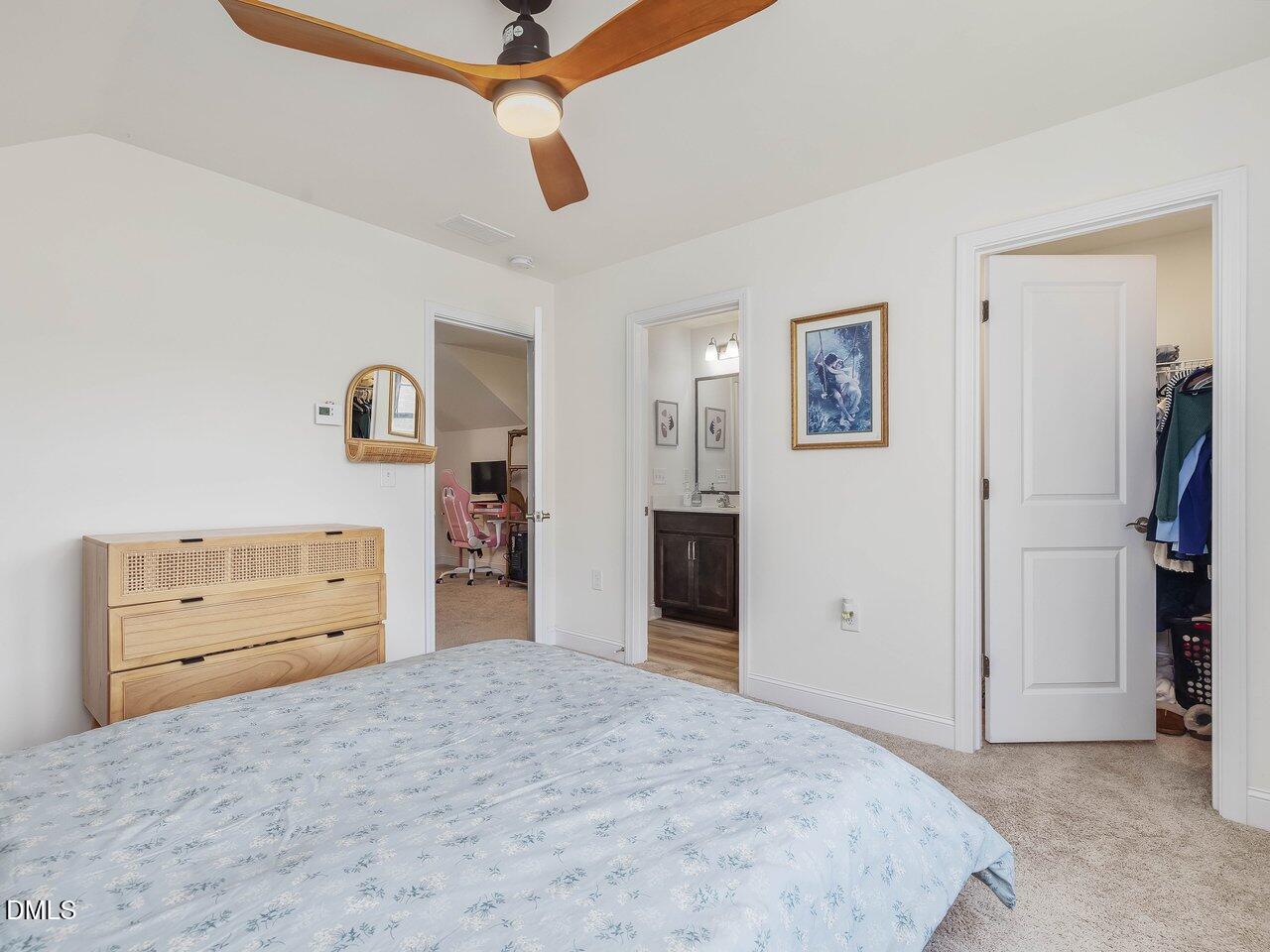 718 Heartpine Drive Mebane, NC 27302 - Photo 50 of 62 a bedroom with a bed and a dresser