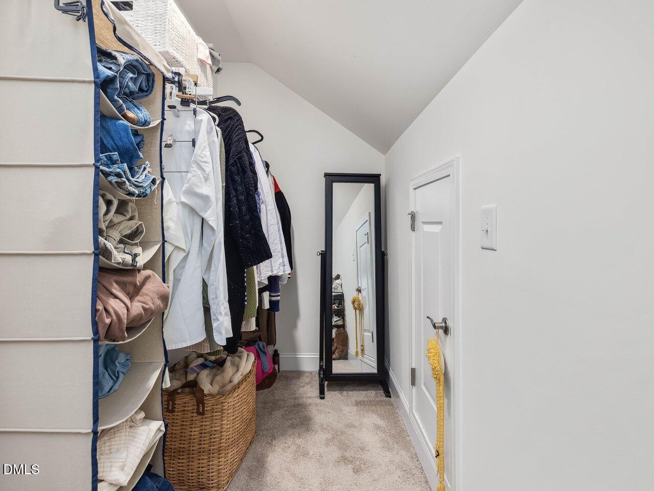 718 Heartpine Drive Mebane, NC 27302 - Photo 52 of 62 a view of walk in closet with clothes and shoes