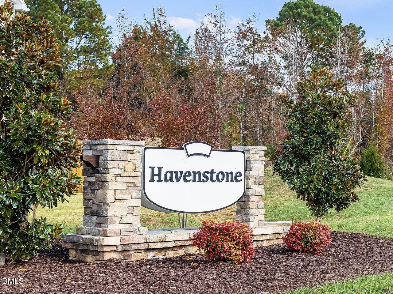 718 Heartpine Drive Mebane, NC 27302 - Photo 55 of 62 a sign that is sitting on a rock