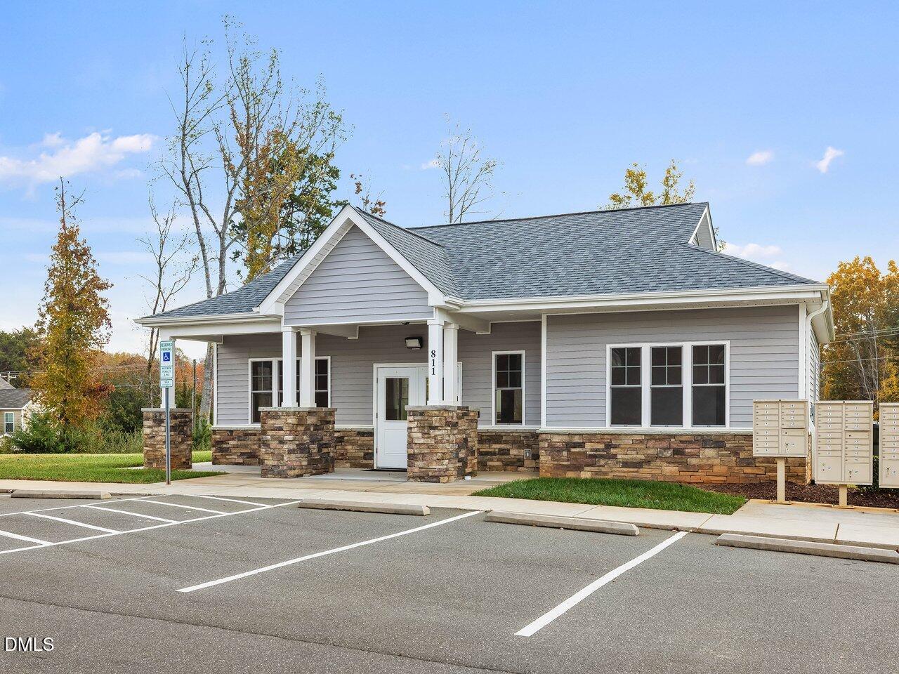 718 Heartpine Drive Mebane, NC 27302 - Photo 57 of 62 a front view of a house with a yard and a garage