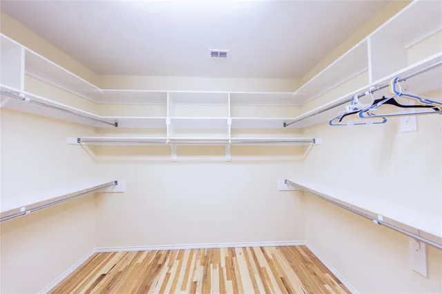 a view of a room with racks on the wall