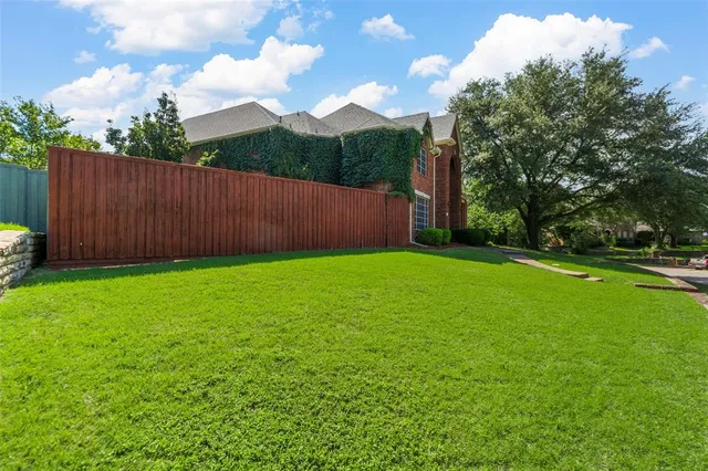a view of a backyard with a garden
