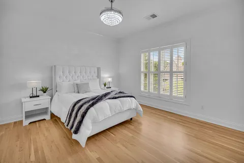 a living room with a couch and a rug