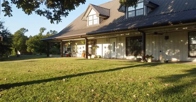 a view of swimming pool with patio