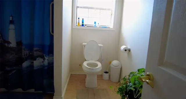 a bathroom with a toilet