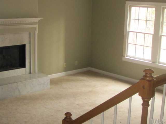 2579 Burton Road Durham, NC 27704 - Photo 3 of 14 a view of empty room with windows