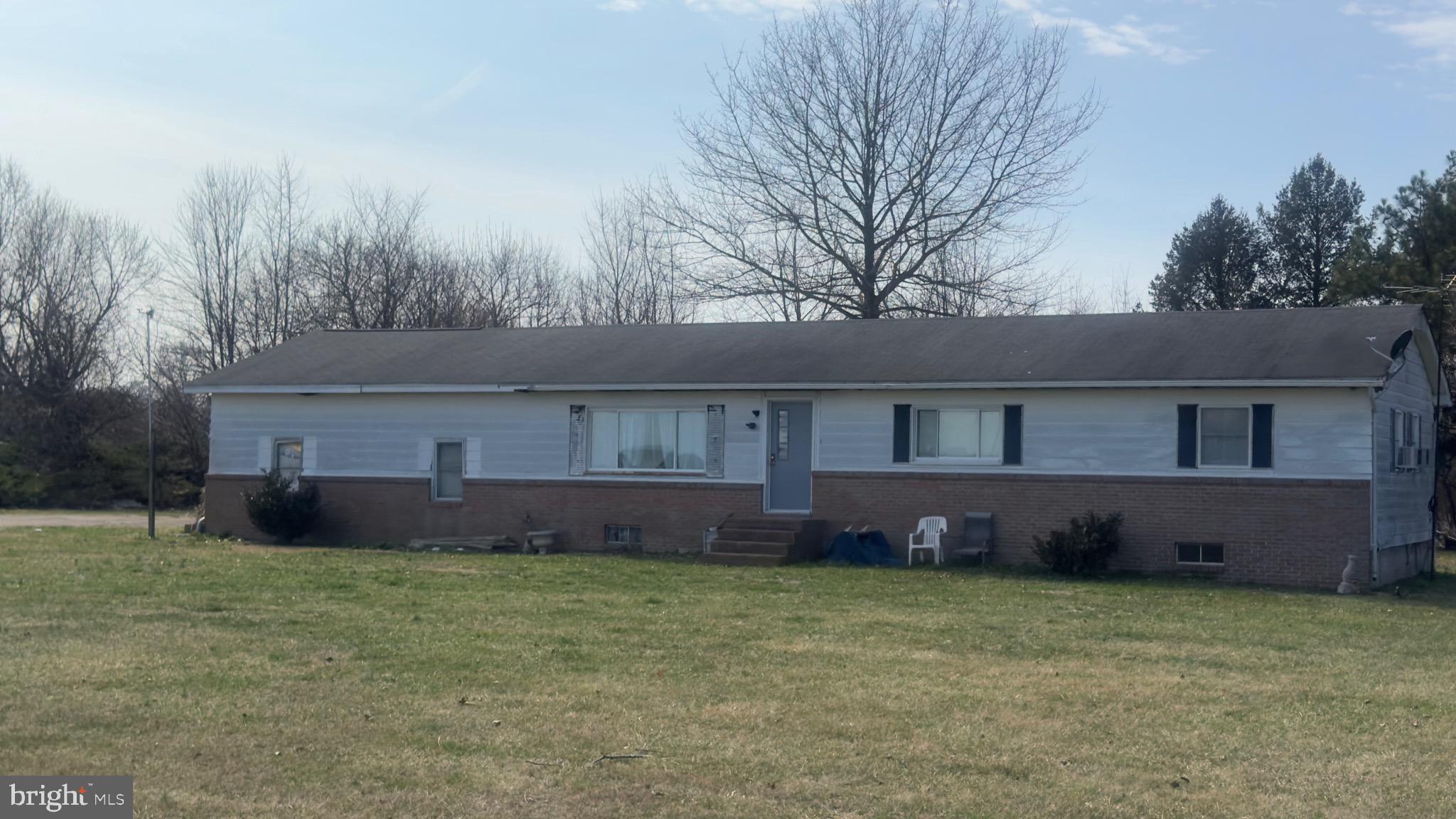 113 Pear Tree Point Road Chestertown, MD 21620 - Photo 1 of 1 a front view of a house with a yard