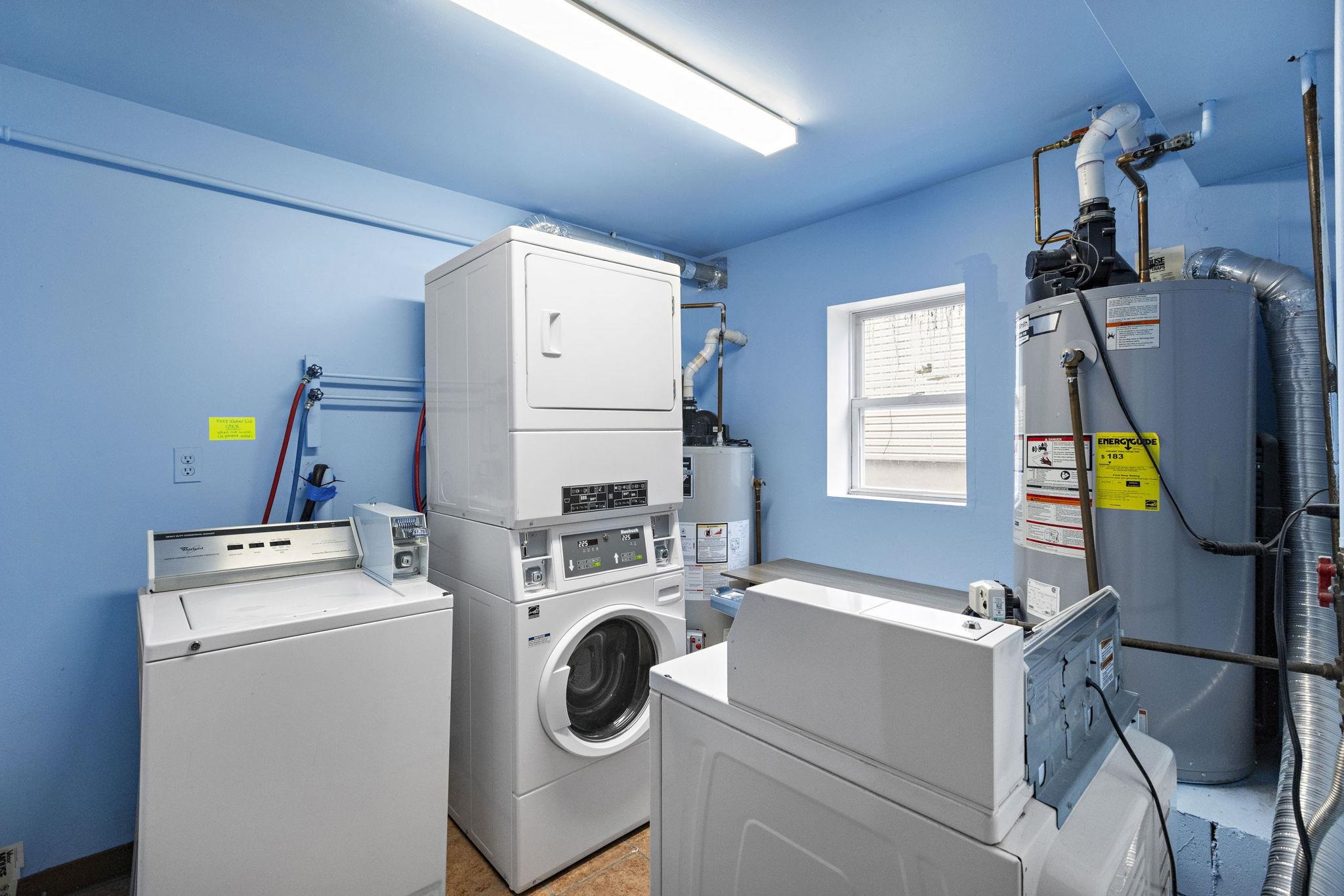 131 Clinton Street, Unit 1 Hoboken, NJ 07030 - Photo 12 of 13 a utility room with dryer and washer