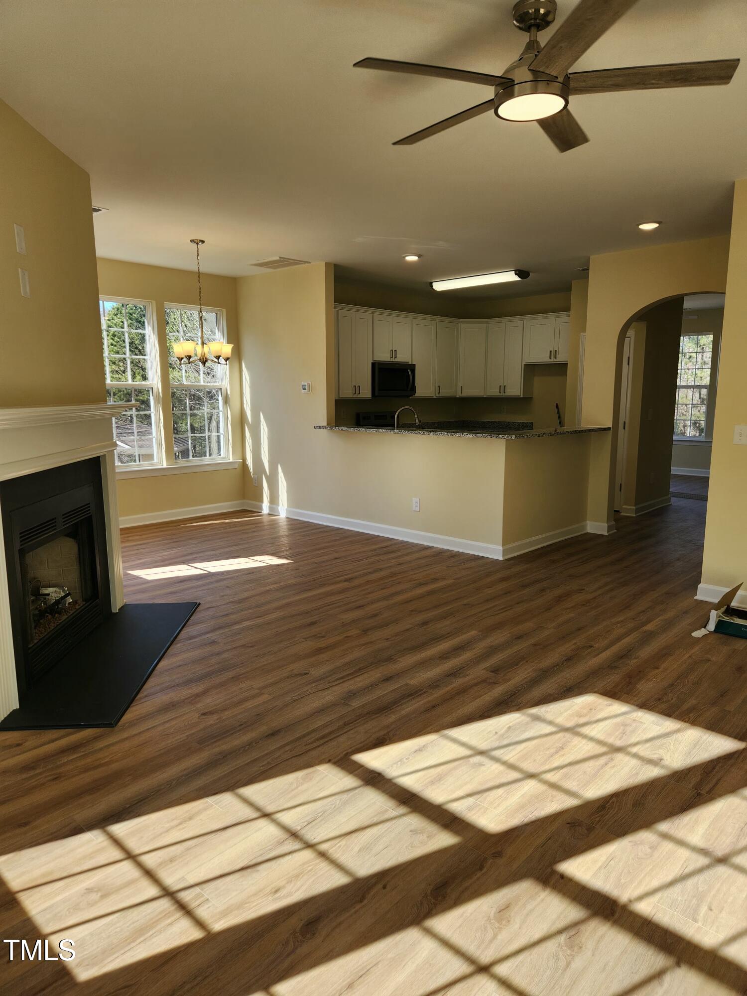 5409 Crescentview Parkway Raleigh, NC 27606 - Photo 7 of 46 Living room to kitchen & dining room