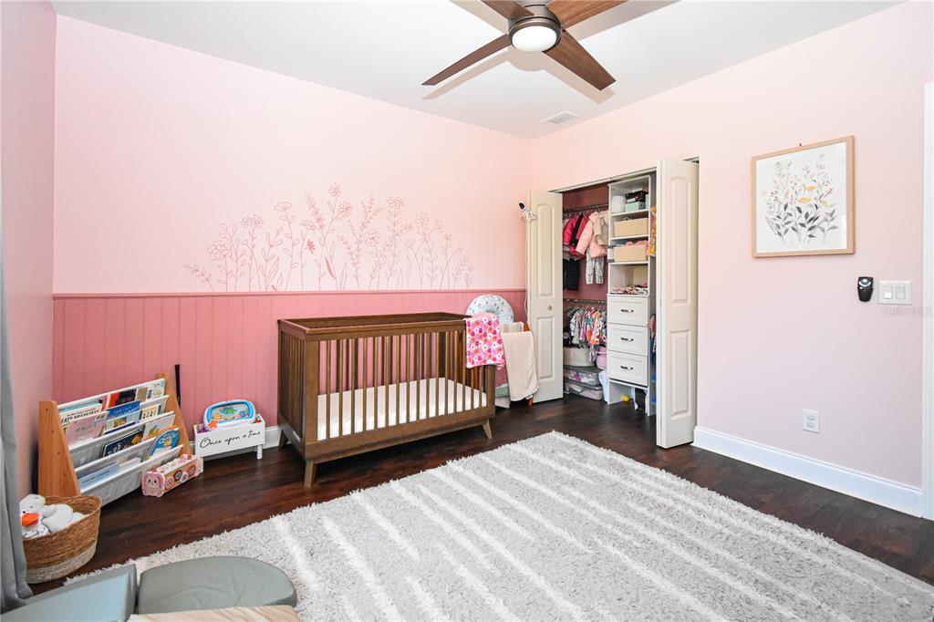 7890 Southwest 129th Avenue Cedar Key, FL 32625 - Photo 26 of 45 a bedroom with furniture and a window