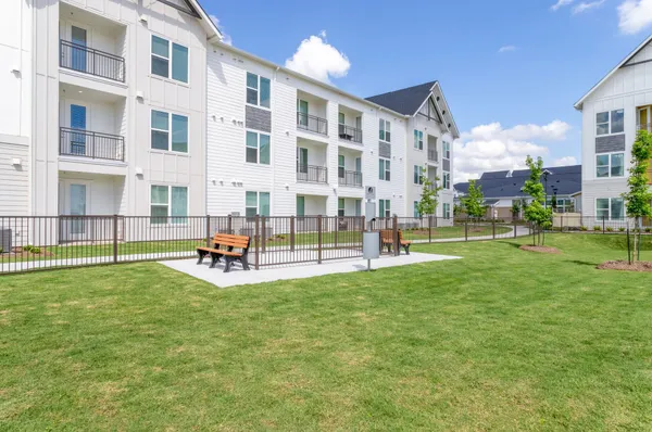 a view of yard with patio
