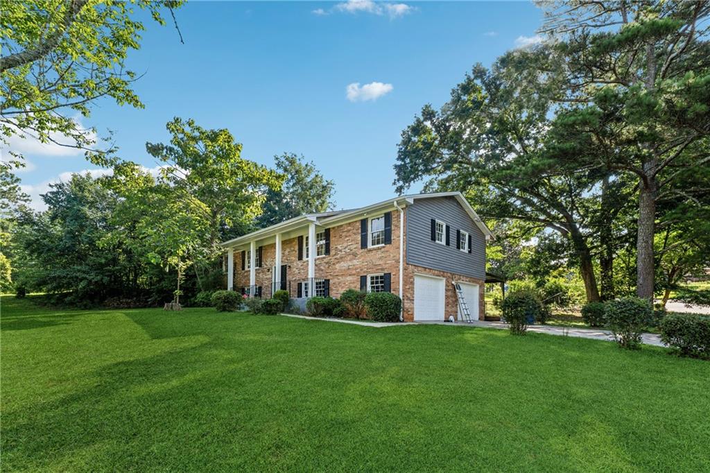 3034 Donavan Way Decatur, GA 30034 - Photo 1 of 1 a front view of house with yard and green space