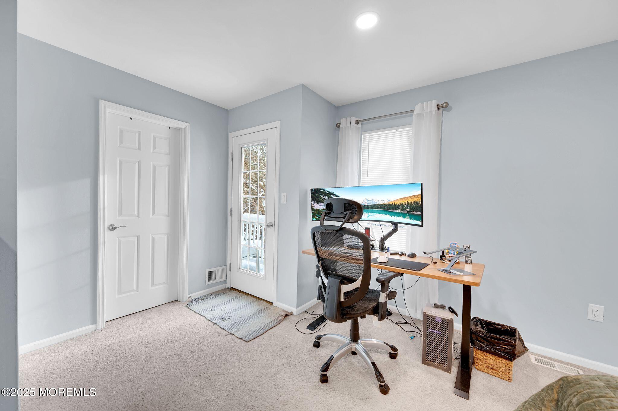 33 South Pointe Circle Tinton Falls, NJ 07753 - Photo 17 of 31 a view of a workspace with furniture and a window