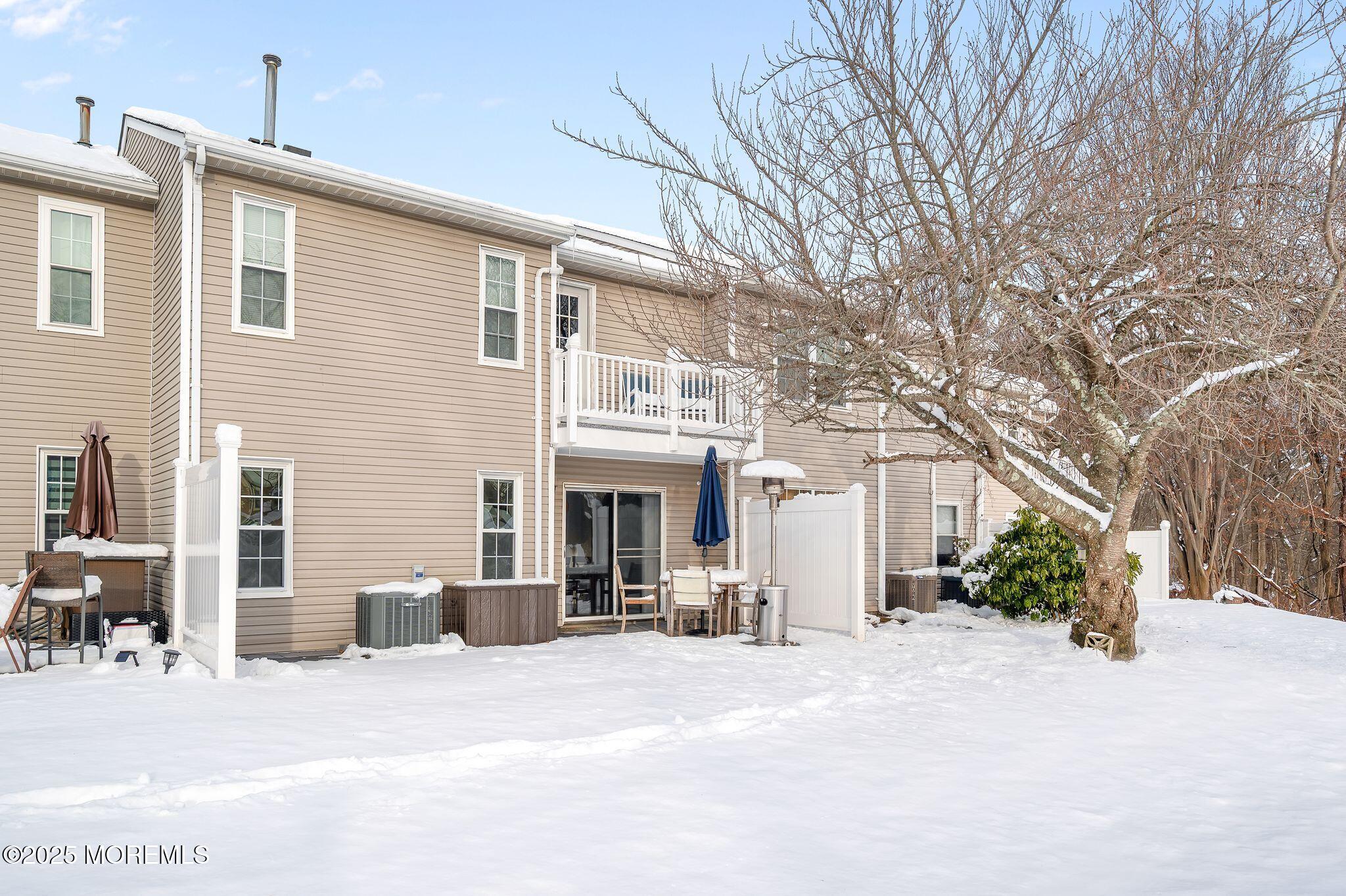 33 South Pointe Circle Tinton Falls, NJ 07753 - Photo 25 of 31 a view of a building with a snow on the road