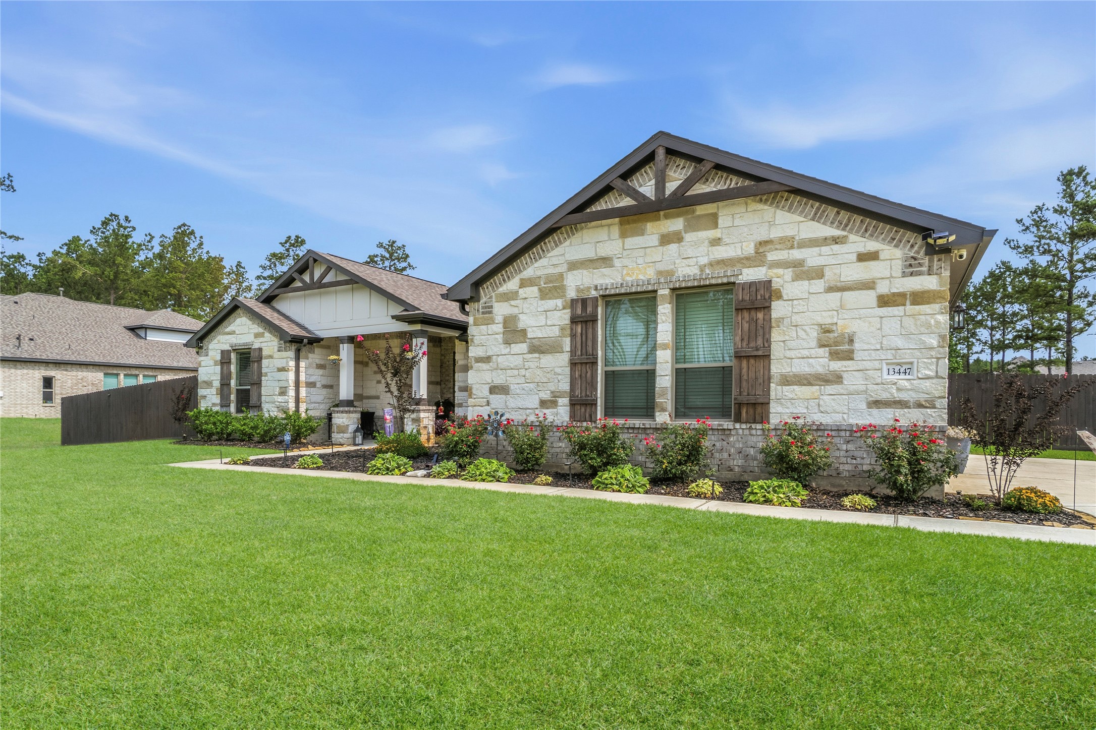 From the stone exterior to the welcoming front porch, every detail brings warmth, character, and timeless farmhouse charm.