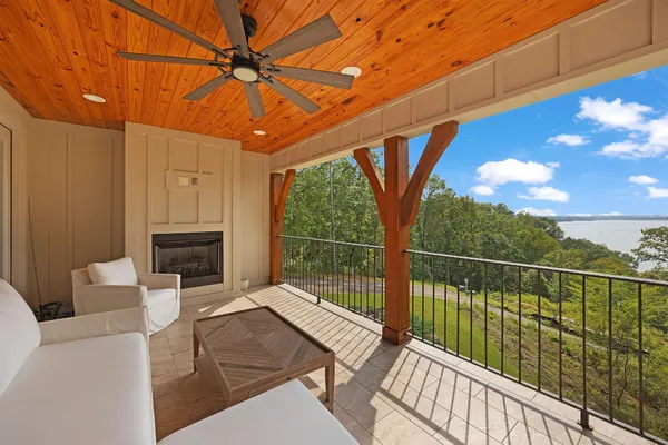 a view of balcony with furniture