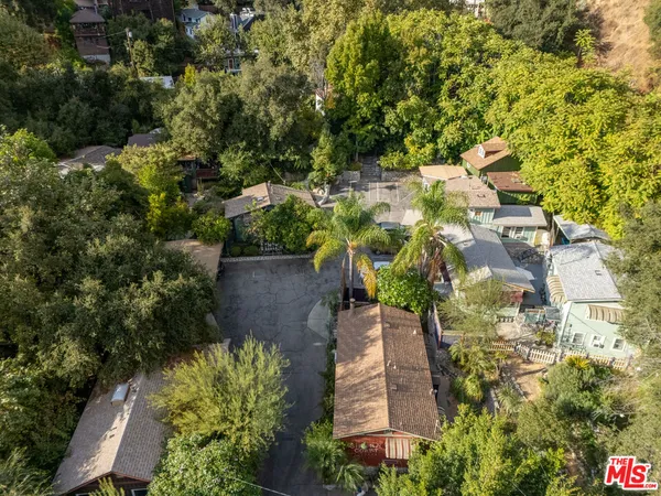 an aerial view of residential house with outdoor space