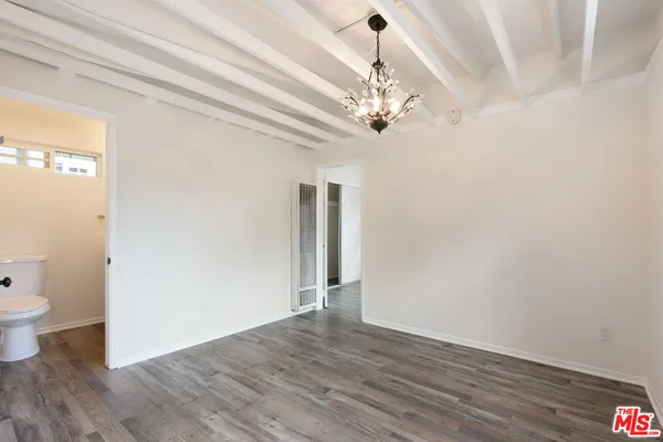 a kitchen with stainless steel appliances a sink dishwasher a stove top oven a sink and dishwasher